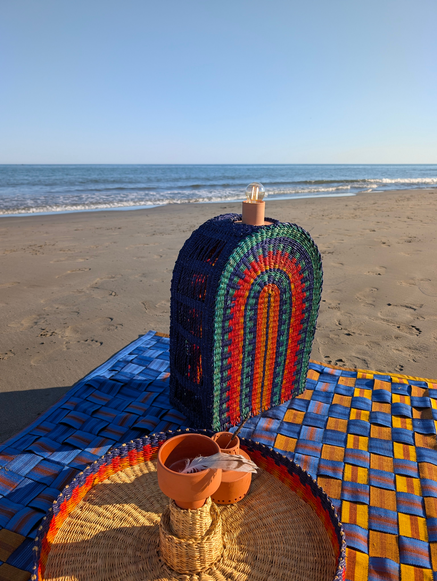 Amira table showcasing the woven elephant grass detail