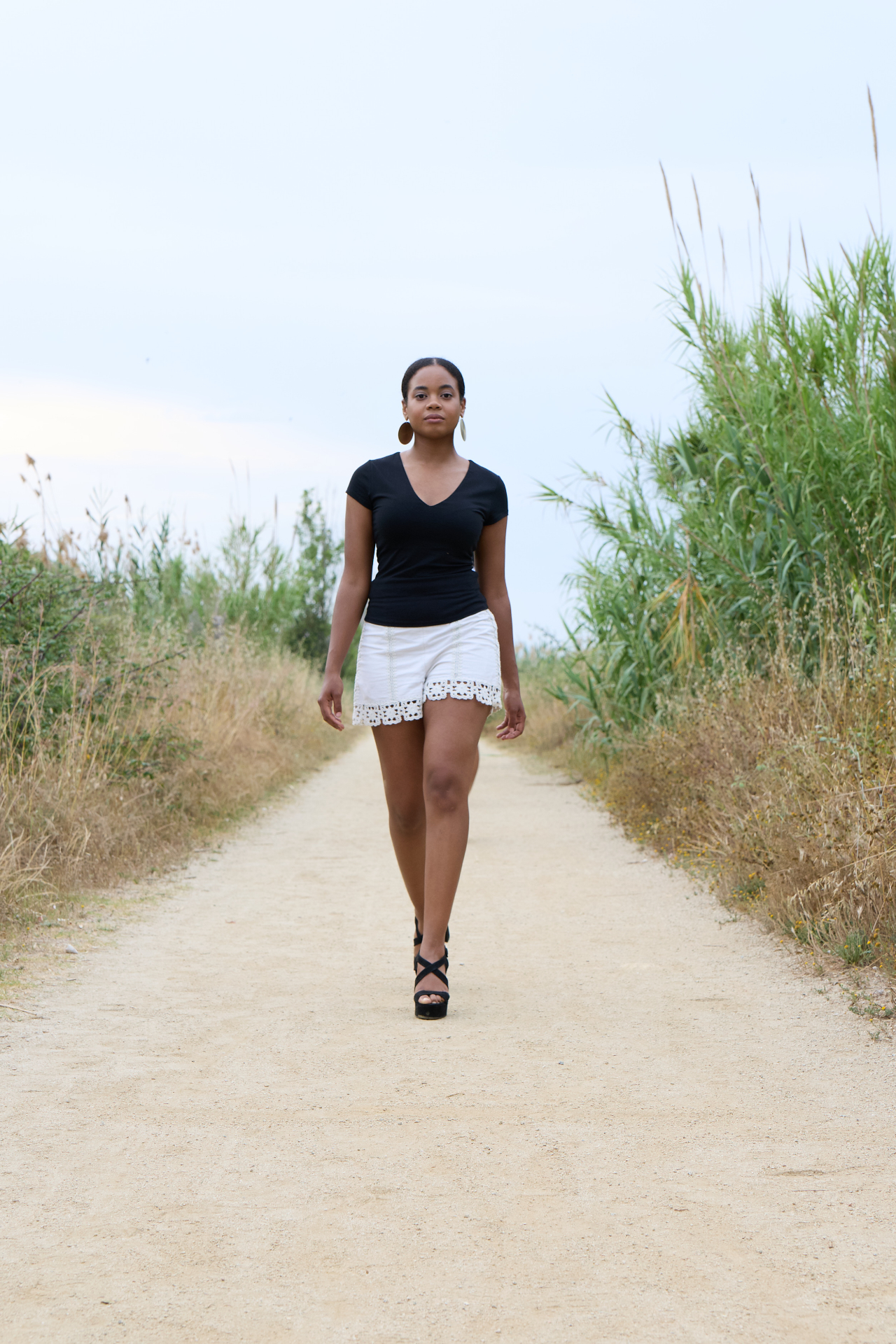 Midnight Loom Tee — front view of slim-fit black cotton with elastane t-shirt worn outdoors