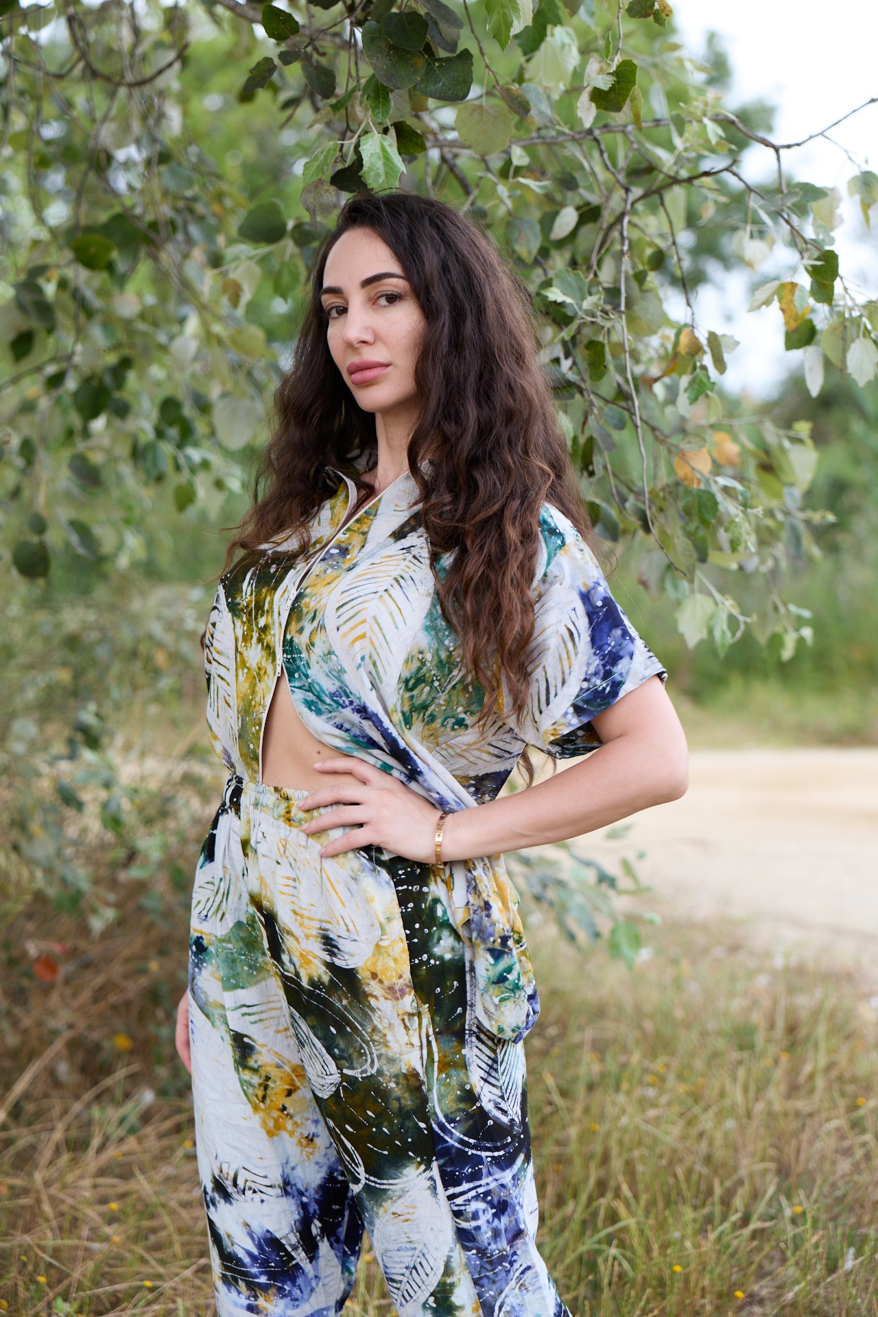 Osun Leaf Batik Co-ord — side view of the leaf batik print top and trousers